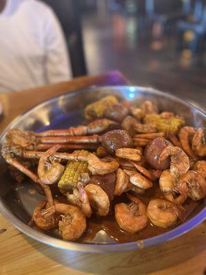 Captain's feast seafood boil with snow crab and shrimp with house special blend sauce