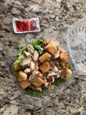 Chicken Salad $6.99, lettuce, croutons, and bits of chicken.