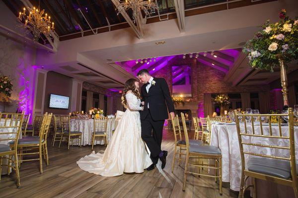 Bride and groom in reception hall