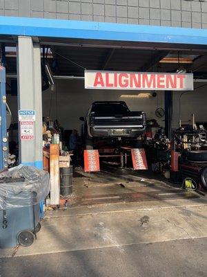 Dan adding air to my tires because apparently another shop that I went too added too much air on my tires.