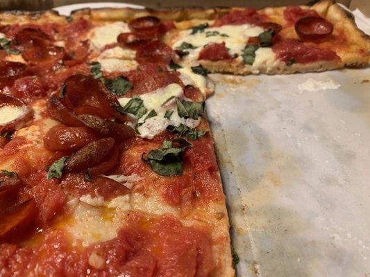 Brooklyn [Grandma] - thin square pizza with tomato sauce, fresh basil & homemade mozzarella. Added pepperoni