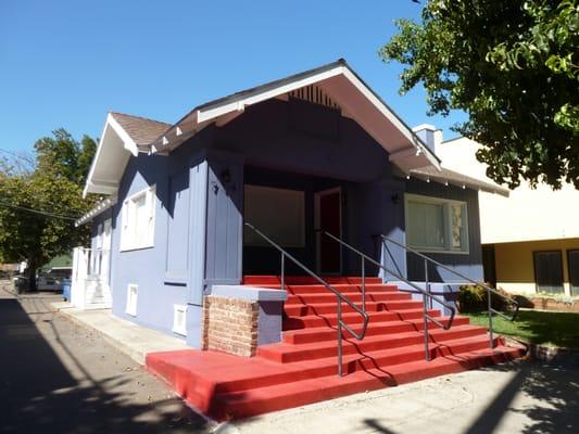 That's us! The blue house with the red steps across McKinley Park. Come stop by and say hi.