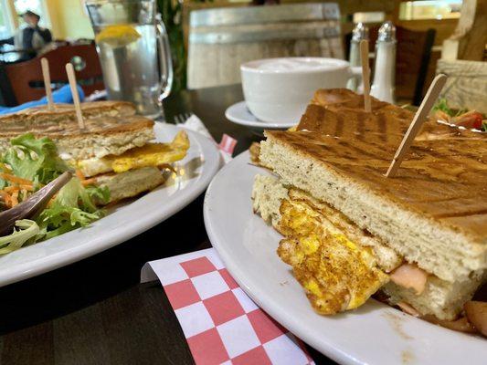 Sandwich with smoked salmon, egg, and avocado on house made focaccia bread