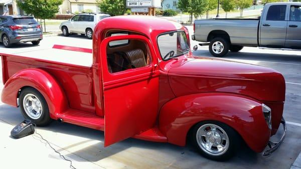 Custom mounted stereo in glove box with front and rear speakers in this classic truck