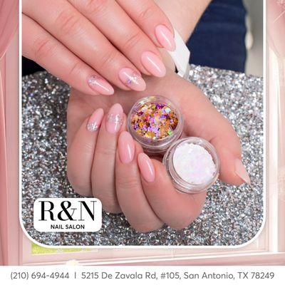 Get ready to shine bright! Sparkle and elegance await you this holiday season with our nail designs!