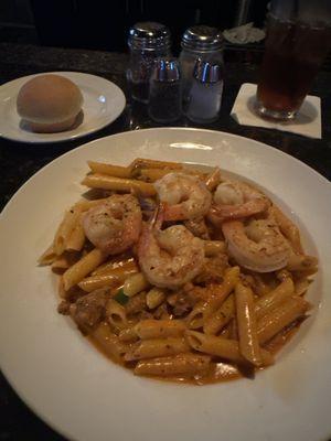 Chefs pasta with shrimp.