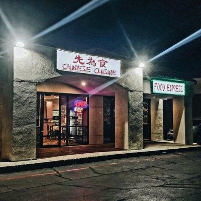 The front exterior of the restaurant. There's a BBQ joint and indoor swap meet to the left.