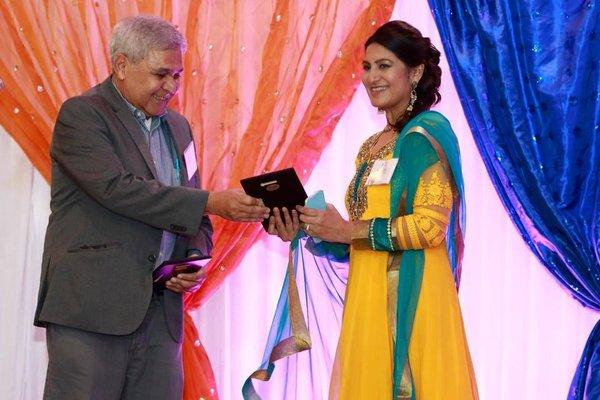 Ruchi receiving an award in our Anarkalli.