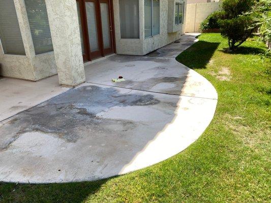 Before Sandblasting- Badly stained concrete with old paint & texture layers. Ugly.