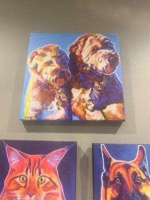 Fun and colorful Wall art throughout clinic representing both small and large breed pets and livestock.