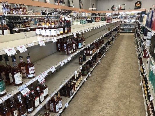 Empty shelves of bourbon