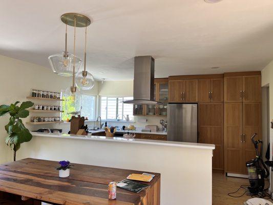 New lighting in this beautiful San Carlos kitchen: (5) streamlined recessed lights, (2) focal lighting & a new dining room chandelier!