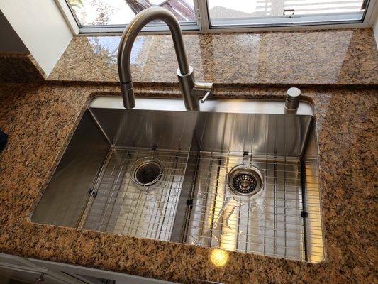 After photo with new stainless steel sink.. Removed old Cast iron sink