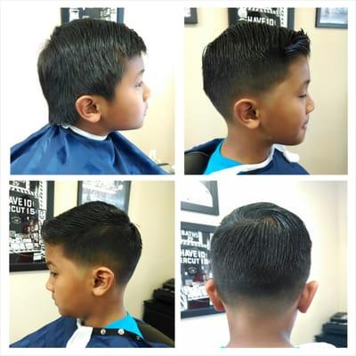 Classic kids haircut with a taper on sides and back