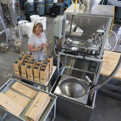 Laurie on the bagging machine.