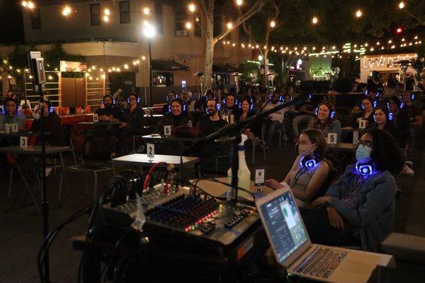 Our outdoor stage audience area wearing "Silent Disco" headphones.