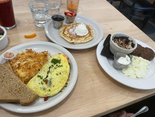 Single pan cake veggie omelette and toast with a a side of fruit  And Way to Condition with a side of goat cheese