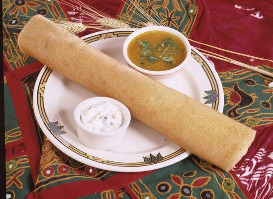 A very popular south Indian crispy crepe made with rice and lentil flour, filled with spiced potatoes. Served with samber (lentil soup) and