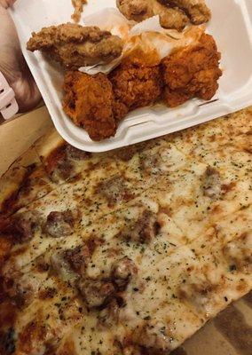 Half cheese/half sausage pizza and chicken wings (half plain/half Buffalo)