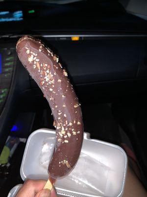 Chocolate covered frozen banana, healthy delicious treat