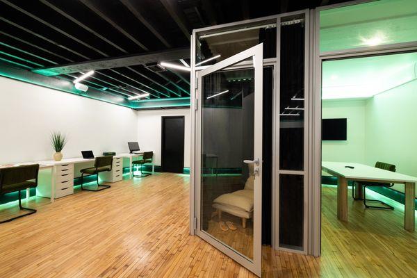 Co-working space, meeting room, and nap pod at BELONG NYC