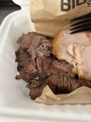 Sliced brisket in a three meat combo 3 Meat Plate