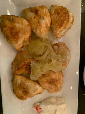 Fried pierogi (side of sour cream and sautéed onions)