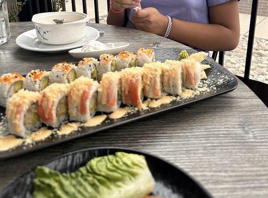 Rai Lay specialty roll and California roll with miso soup in the background