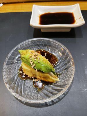 Part of Omakase - egg topped with toro and unagi and avocado