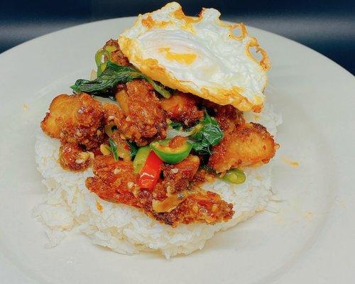 Kao Kra Prow Kai Krob (Spicy Basil with crispy chicken)& fired egg.