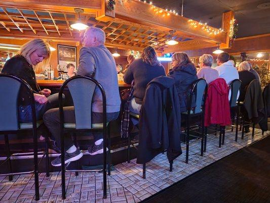 Bar area. There are also small tables that you can sit at while you wait for your reservation to come up.