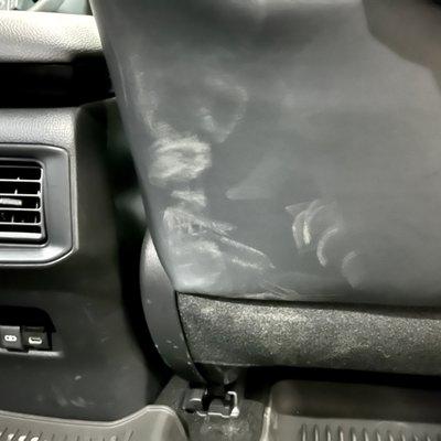 Stains on the back of front passenger seat