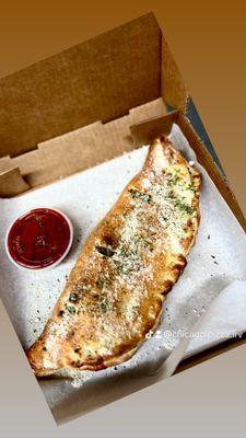 Calzone with marinara sauce