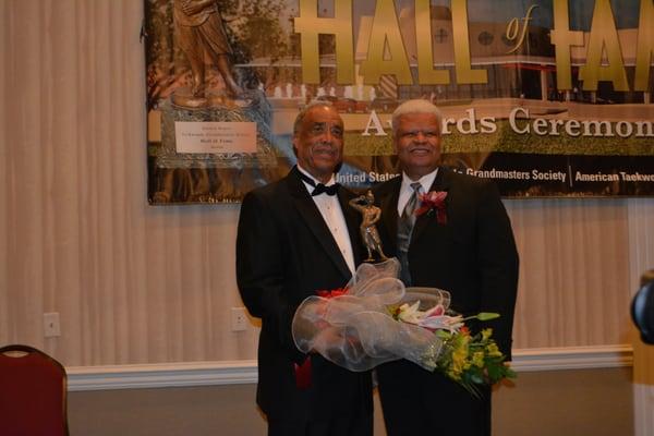 USAT President Bruce Harris presents Hall of Fame honors to Grandmaster Robinson