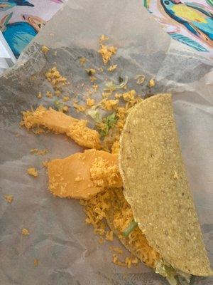 Taco with a chunk of cheese thanks del taco. If I wanted a chunk of cheese I would of gone to the grocery store for a block of cheese.