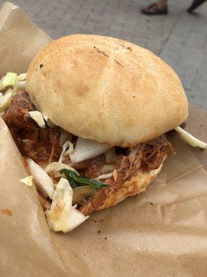 Pulled pork sandwich with apple cabbage slaw