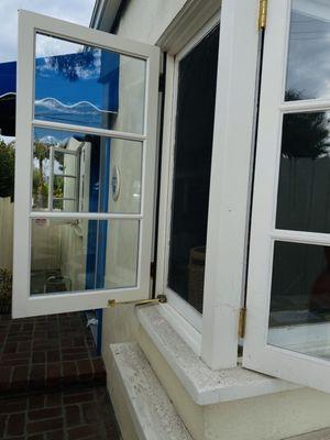 Sparkling windows and a happy client!
 Check out the "before" and "after" photos to see the difference