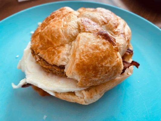 Meat Lovers Croissant | egg, cheese, bacon, & chicken sausage served on a fresh butter croissant