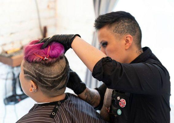 Lulu shaving designs into hair