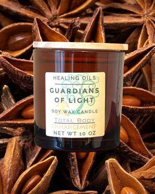 Guardians of Light custom handcrafted 10 oz candle special protection candle with herbs and stones