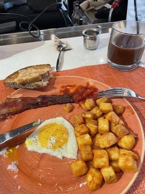 CCC's traditional plate breakfast - half-eaten before I remembered to take a picture!