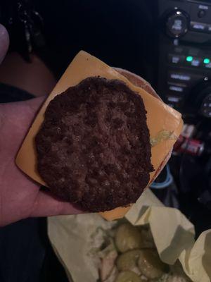 Cold cheeseburger was served when we asked her to make our order correct Horrible customer seevice