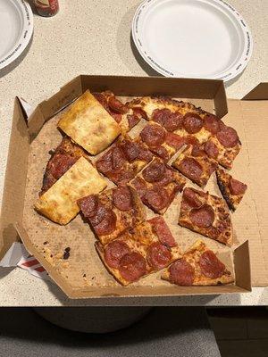 Pizza delivered by dominos like this.