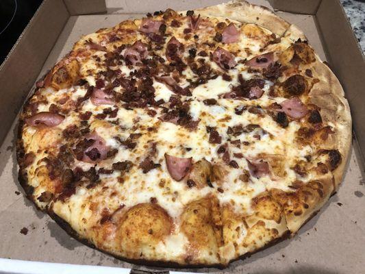 Bacon & Canadian bacon pizza.