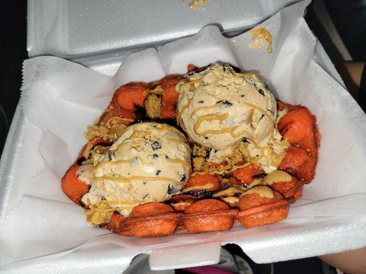 Red Bubble Waffle with honey roasted peanut butter ice cream and peanut butter drizzle