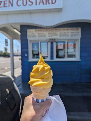 $2.98 Mango Whip (dairy-free) on a flat cone.