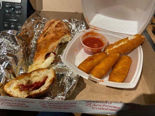 Definitely freshly made, but the cheese sticks are drenched in oil and the pepperoni roll is super doughy with minimal pepperoni.