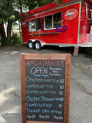 Menu of food truck located in the parking lot