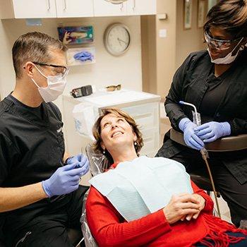 Dr. Robert Cudia with a patient