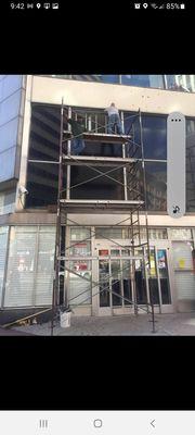 Exterior Storefront Glass Being Replaced on Schaffolding.